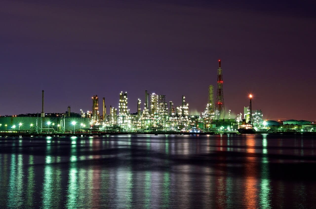 Industrial waterfront lit up at night